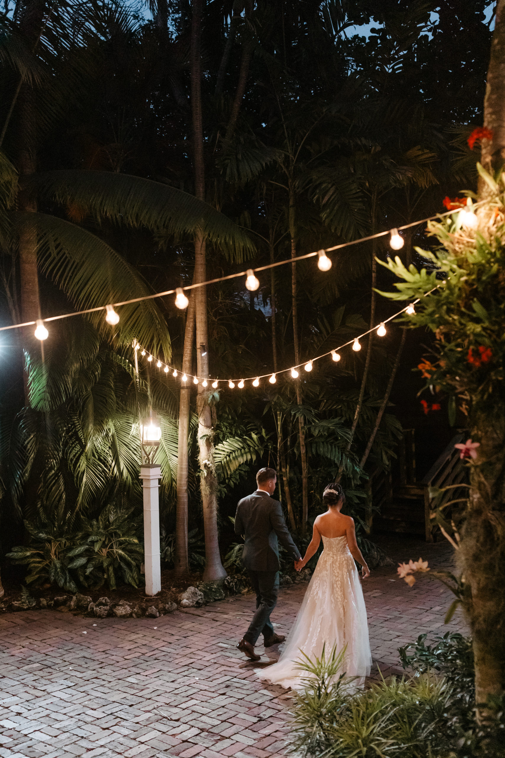 the Key West photographer captures the bride and groom walking away at the end of their wedding day