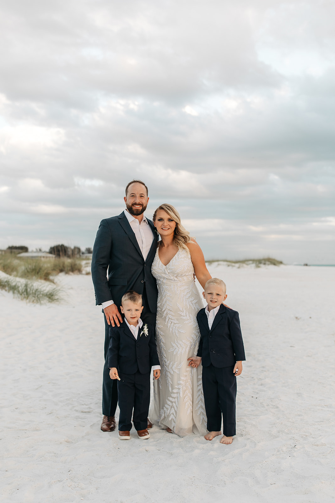 a family photo at the beach elopement in Anna Maria Island in Florida