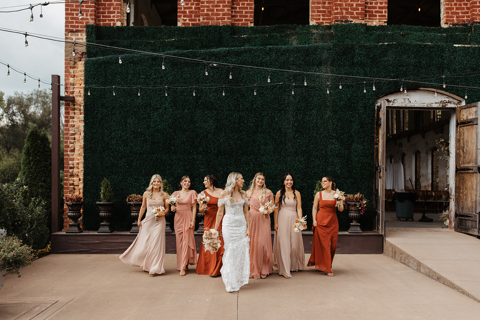 the bridesmaids walking towards the camera