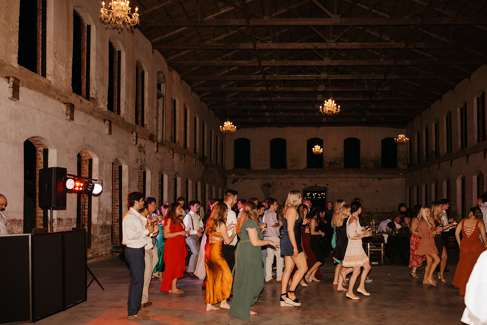 the friends and family dancing in the unique wedding venue