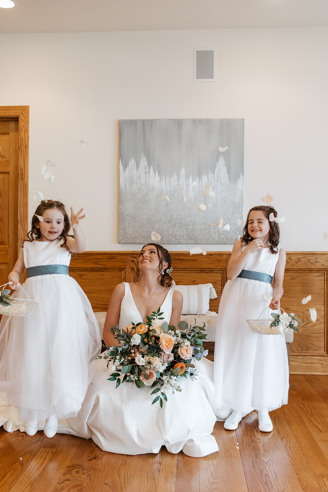 the bride with the flower girls