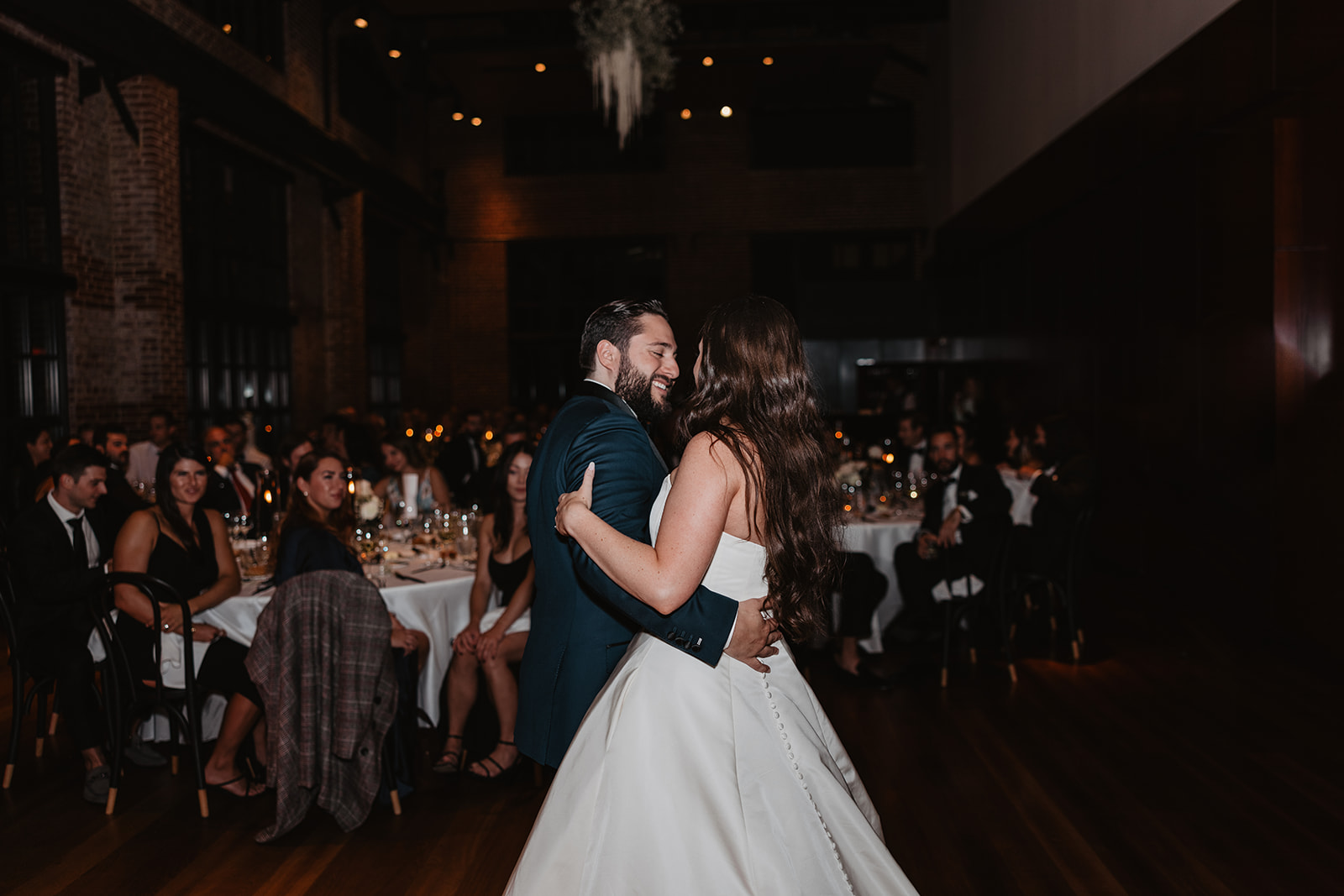 the bride and groom's first dance captured by the wedding photographer in Washington DC