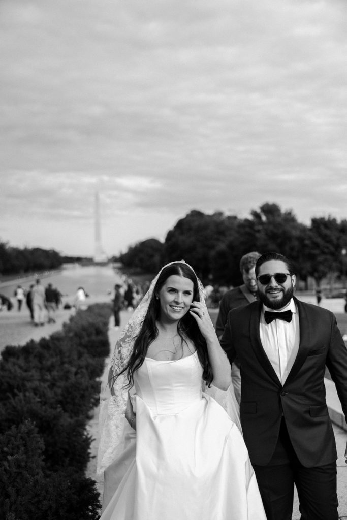 the couple walking around the iconic locations of Washington DC