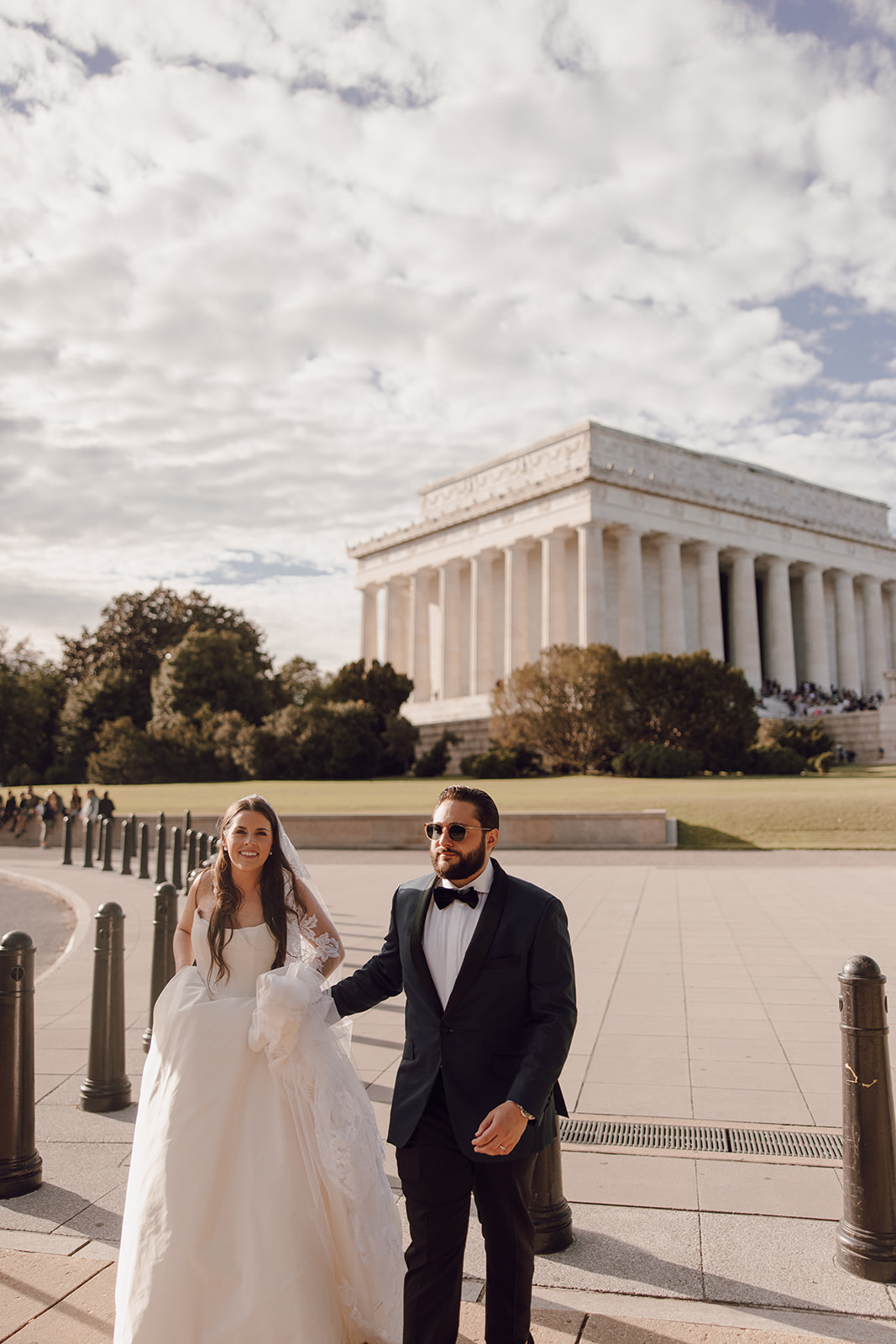 the couple walking away from the Lincoln Memorial