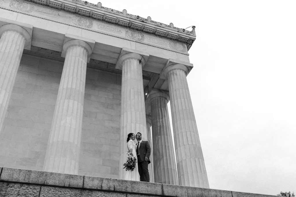 the couple at the Lincoln Memorial for their wedding photos