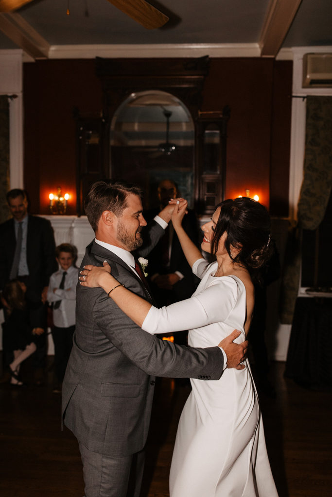 the bride and groom's first dance at their hotel wedding