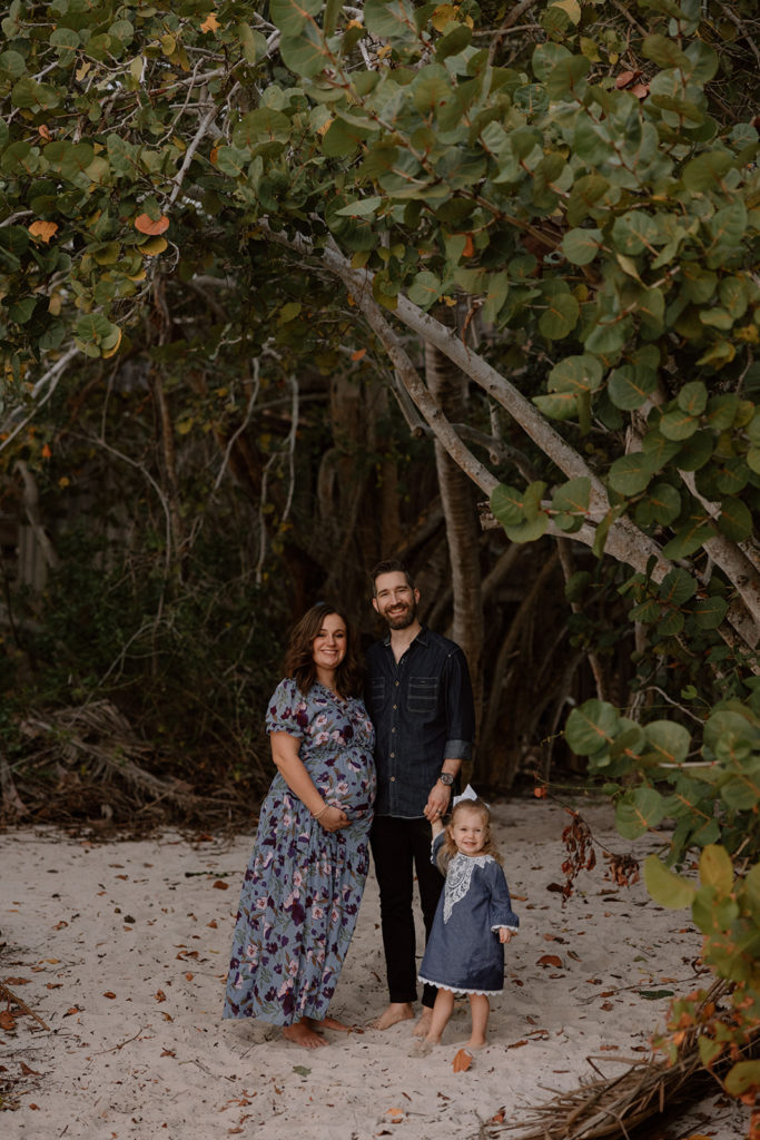 the family smiling at the Florida family photographer