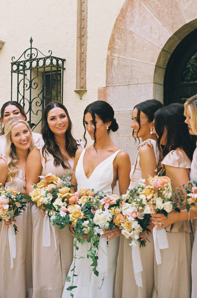 the bride and bridesmaids at the spring wedding in Florida
