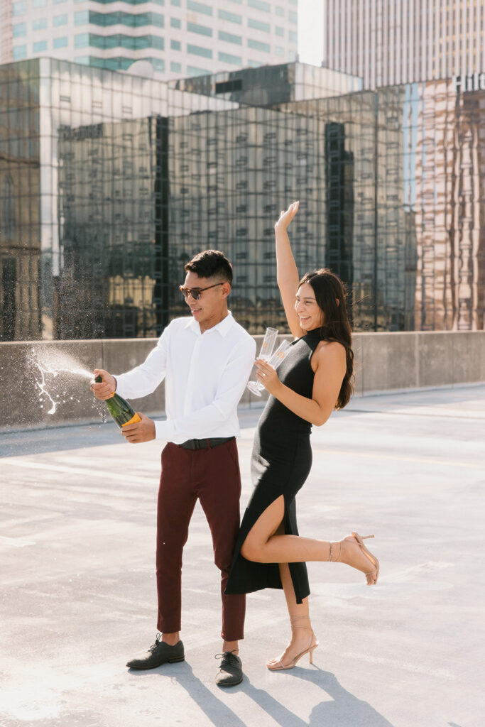 champagne pop photos for engagement photoshoot creative ideas