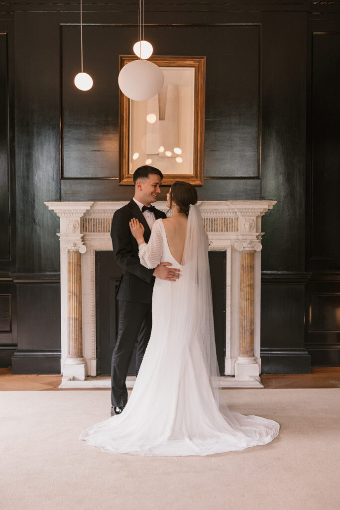the bride and groom at their wedding venue in washington dc for their destination wedding 