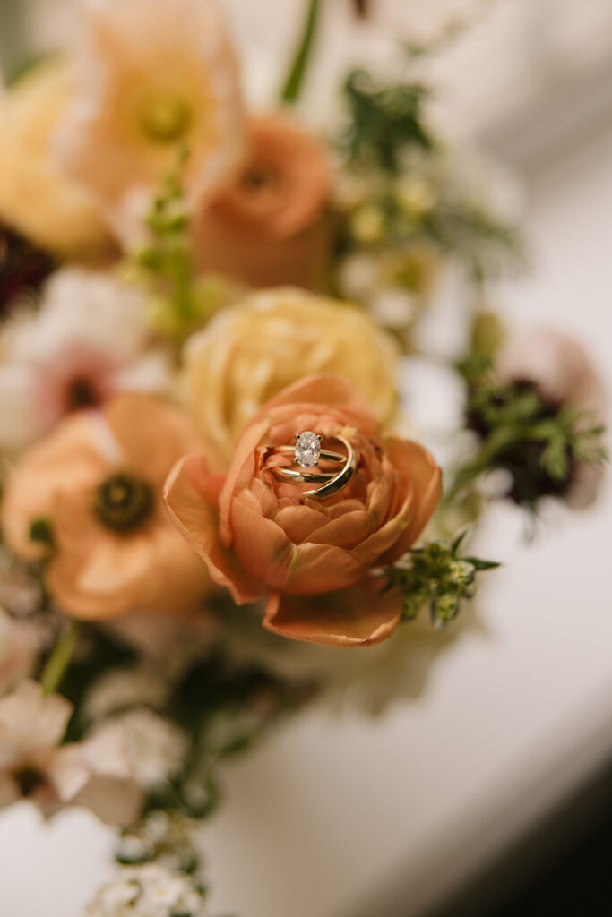 wedding flowers and rings wedding detail photography