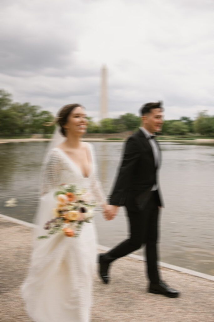 blurry wedding photography holding hands