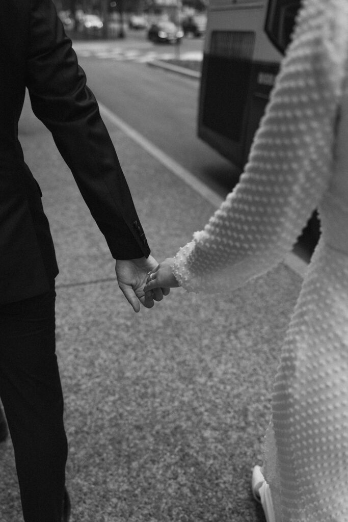 close up wedding photography holding hands