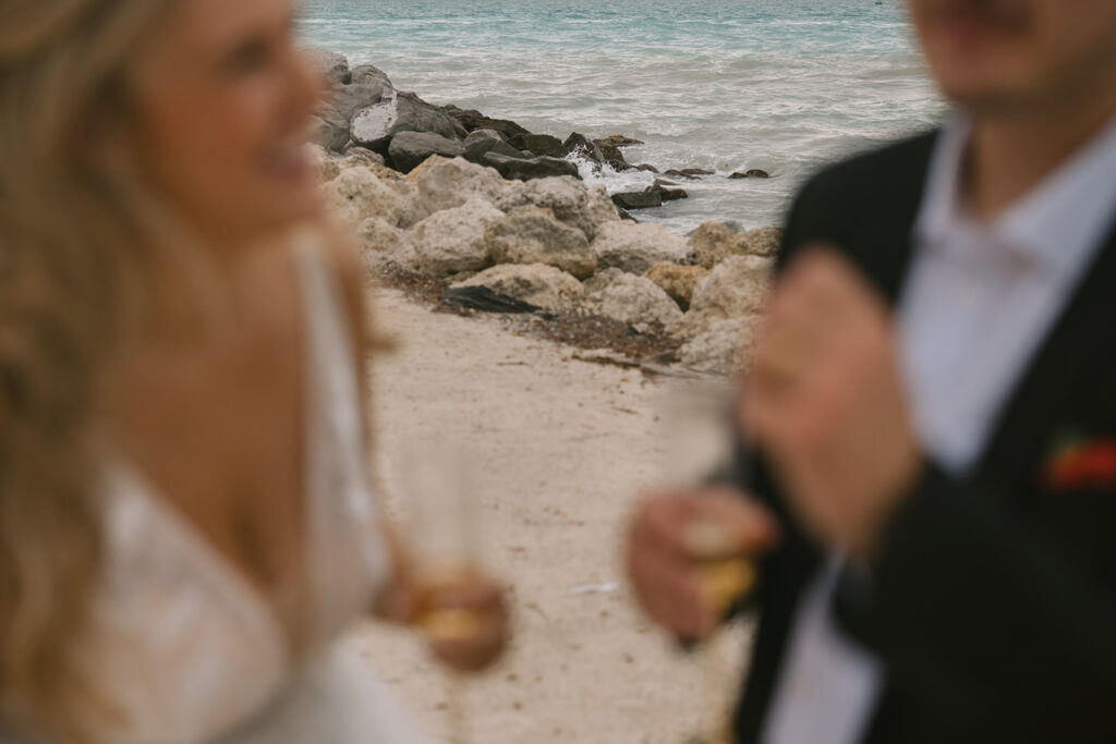 the bride and groom with their champagne at their Key West elopement