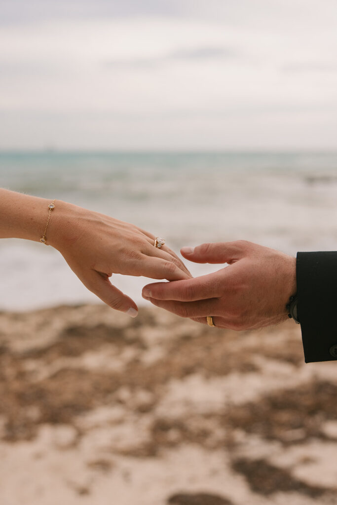 the bride and groom holding hands during their Key West elopement