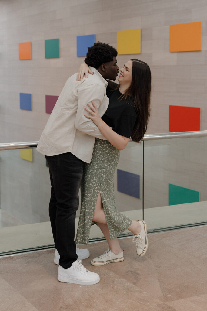 the engaged couple at the art museum