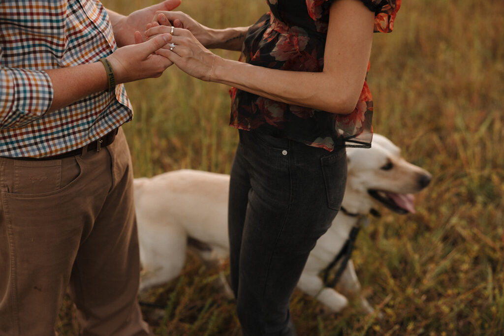 the dog in the background during their proposal photos